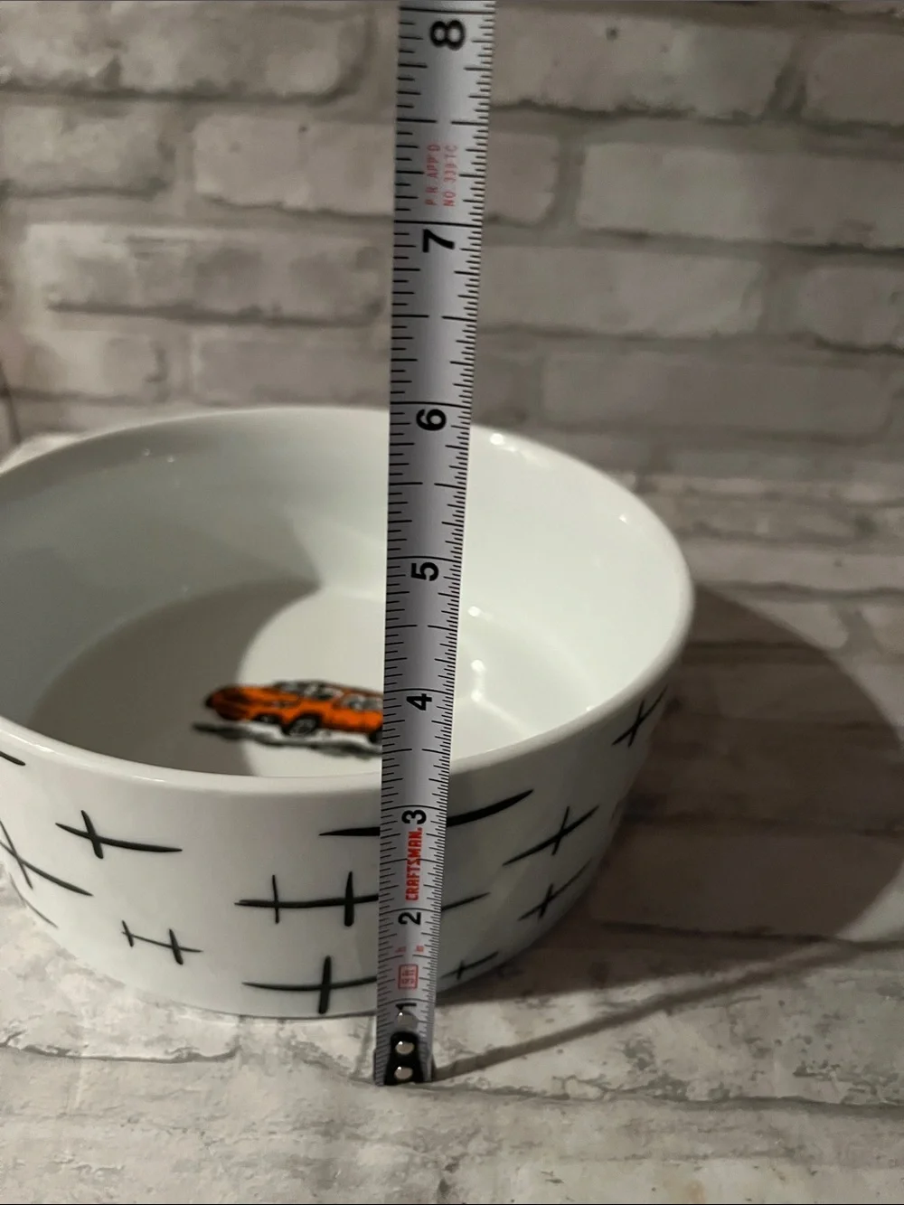 White Ceramic dog dish Bowl with Orange Car Accent and dogs